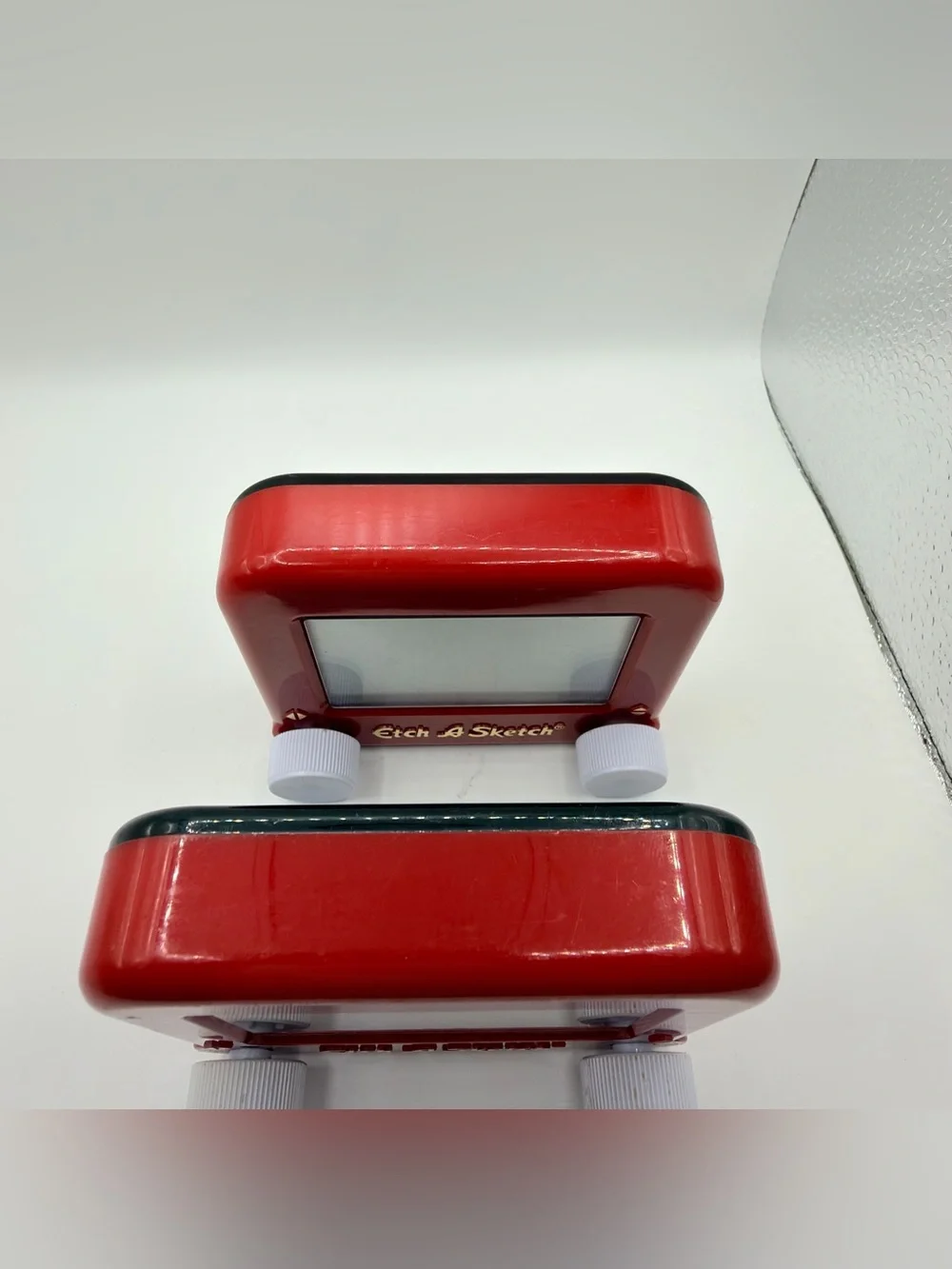Pair of Mini Classic Red etch a Sketch toys